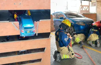 Bomberos de Rionegro utilizaron sistemas de cuerdas y anclajes para evitar la caída de un vehículo que quedó suspendido tras un accidente en un parqueadero residencial.
