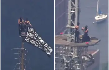 La policía de Nueva York detuvo este miércoles a un hombre y una mujer que lograron burlar los controles del Empire State para subir sin permiso a su antena. FOTO: Captura de video de redes sociales 
