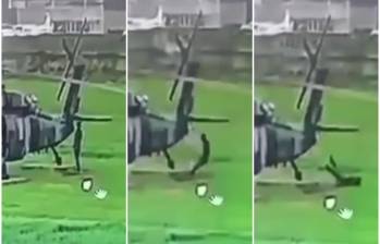 Secuencia de cómo se desplomó el soldado luego de que le cayera el rayo cuando realizaba sus labores al lado de un helicóptero. FOTO: Captura de video de redes sociales @sucesoscauca