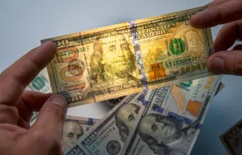 El dólar alcanzó a marcar en su precio mínimo de negociación los 3.590 pesos. FOTO EL COLOMBIANO. 