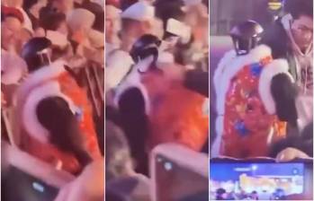 El robot, que hacía parte del equipo de seguridad en el festival, atacó descontroladamente a una persona en un festival en China. Portaba un chaleco de color rojo. FOTO: CAPTURA VIDEO REDES SOCIALES 