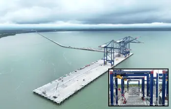 Adelante, las enormes grúas de contenedores con las que cuenta el puerto. Atrás, panorámica de Puerto Antioquia. FOTO: Cortesía