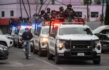 Operativos de seguridad en Jalisco dejaron 41 capturados tras disturbios por la muerte de “El Mencho”. FOTO: Getty Images. 