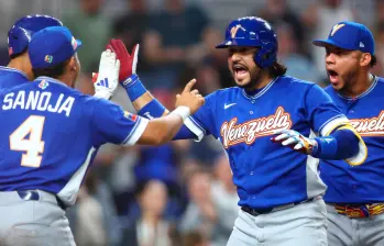 El beisbolista venezolano Eugenio Suárez fue una de las figuras del encuentro entre su país y el seleccionado de Italia. Foto: AFP