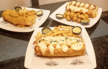 Entre las comidas con ultraprocesados favoritas de los paisas están las hamburguesas y los perros calientes. Foto: Esneyder Gutiérrez