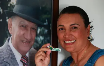 Nury Alejandra Mejía Arango pudo completar el dinero para su casa nueva gracias a la Gobernación de Antioquia; su padre Jairo Antonio Mejía, fallecido, fue quien le dejó el plante. FOTO Manuel Saldarriaga