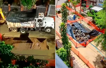 La volqueta, que era utilizada para una obra de EPM en el barrio Los Ángeles, centro de Medellín, terminó en un hueco desde finales de la semana pasada. Se están pensando en estrategias para extraerla. FOTOS: CORTESÍA