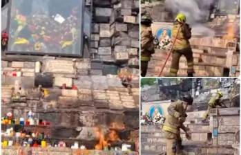 Varias veladoras dejadas en la virgen de La Aguacatala quedaron envueltas en llamas y tuvieron que ser apagadas por los bomberos. FOTOS: Cortesía