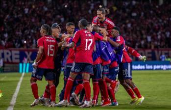 Jugadores del DIM en el festejo del cuarto gol frente a Palestino. FOTO: Juan Antonio Sánchez