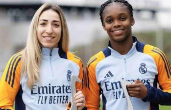 La colombiana Linda Caicedo junto a su compañera del Real Madrid, Olga Carmona, elegidas en el once ideal de la Fifpro. FOTO TOMADA X@FIFPRO