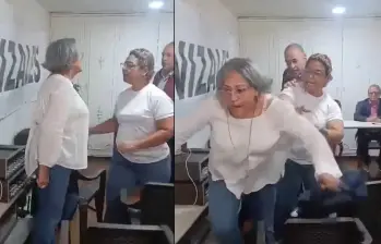 Este es el momento en el que la delegada Martha Tobón es empujada. FOTO CAPTURA DE PANTALLA