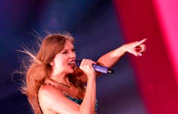 Taylor Swift no solo batió récord en los Grammy, sino que generó un increíble aumento en las reproducciones de sus canciones en la plataforma Spotify. FOTO AFP 