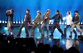 BTS sorprendió a sus seguidores en Bogotá al usar expresiones colombianas durante su primer concierto. FOTO: Getty
