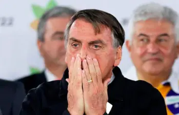 En una visita al Congreso, el expresidente se paró ante las cámaras y además de dar declaraciones, mostró por primera vez la tobillera electrónica que le pusieron en la pierna izquierda. FOTO: Getty