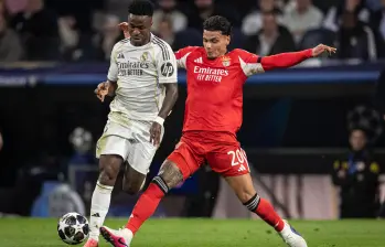 Richard Ríos junto a Vinícius Júnior en el partido entre el Real Madrid y el Benfica. FOTO GETTY