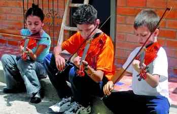 Músicos del futuro. Imagen que hace parte de la serie ganadora del III Salón Nacional de Fotografía. FOTO: Manuel Saldarriaga.