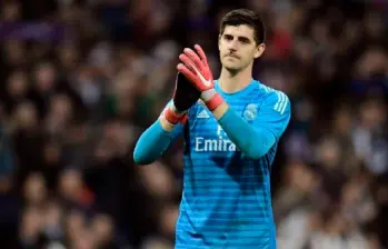 Thibaut Courtois fue una de las figuras del Real Madrid en la serie por Champions ante el Atlético. FOTO: AFP