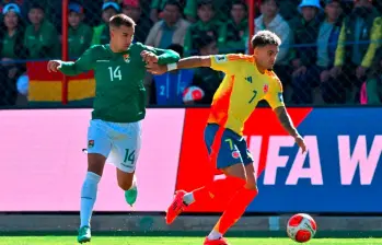 Imágenes del encuentro entre Bolivia y Colombia en El Alto. FOTO AFP