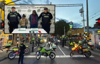 Adelante, los dos capturados por la Policía. Atrás, megaoperativo sobre la calle San Juan. FOTO: Cortesía Alcaldía de Medellín