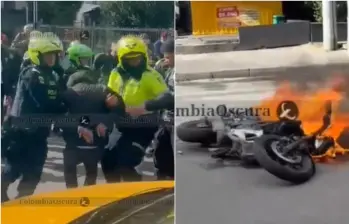 El hecho ocurrió precisamente sobre la calle 95 entre carreras 13 y 14, en inmediaciones del Parque de la 93, de la localidad de Chapinero. La comunidad incendió la moto de los delincuentes. FOTO: CAPTURA VIDEO REDES SOCIALES @COLOMBIAOSCURA