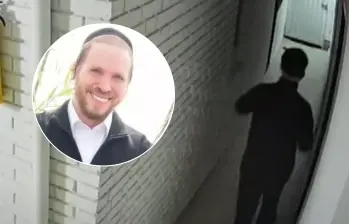 Las imágenes del rabino extranjero Nuchem Yisrael Eber saliendo de un apartamento en Bogotá. FOTOS: Cortesía- captura de video 