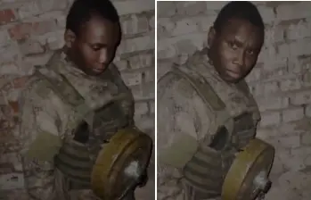 La imagen de Francis Ndung’u Ndarua con una minta antipersonal atada en el pecho. FOTOS: Capturas de video 