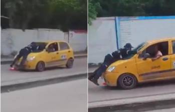 Momentos que muestran como el taxista llevaba encima del capó al agente de tránsito en Soledad, Atlántico. FOTO: Captura de video de redes sociales