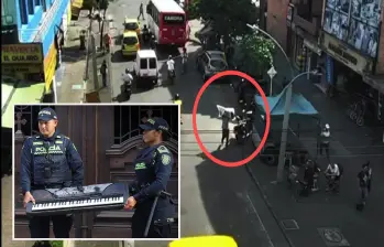 Adelante, el instrumento musical recuperado por las autoridades. Atrás, el seguimiento por cámaras al ladrón. FOTO: Cortesía.
