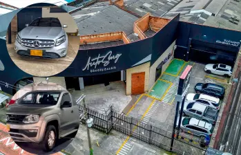 Las dos sedes de Autos MG (antes Autosur) en Premium Plaza y la Milla de Oro, en El Poblado, se encuentran cerradas; en una de ellas ya se llevaron los vehículos. FOTO MANUEL SALDARRIAGA