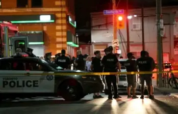 Buscan a tres hombre que serían responsables de un tiroteo ocurrido en Toronto, Canadá. FOTO: AFP