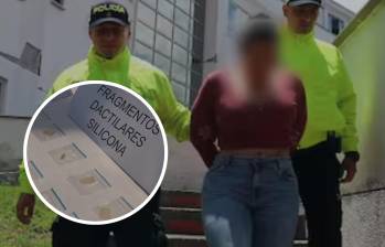 El destape de esta modalidad se dio con la detención de esta mujer en una notaría de Dosquebradas, al descubrirse que utilizaba documentos alterados y huellas dactilares sintéticas para traspasar predios ajenos. FOTO: Policía Nacional y cortesía