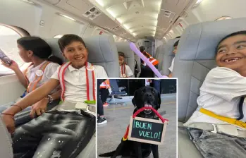Atrás, algunos de los niños durante su primer vuelo en avión. Adelante, uno de los caninos del aeropuerto de Medellín. Dándoles la bienvenida. FOTO: Cortesía
