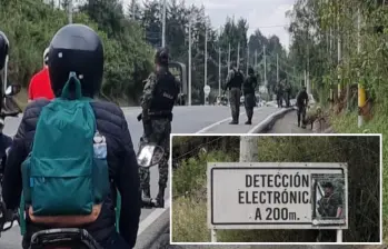 Adelante, el afiche dejado por las Disidencias. Atrás, las autoridades hacen el cierre preventivo de la vía. FOTO: Cortesía Denuncias Antioquia