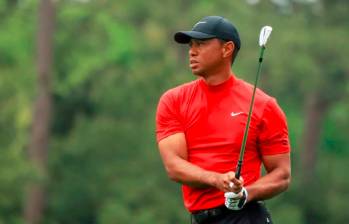 Más allá de las dolencias físicas que arrastra, Tiger Woods manifestó que adora competir. En Augusta buscará su sexto título. FOTO AFP