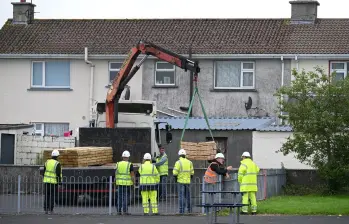 Estas fueron las excavaciones en el antiguo Hogar para Madres y Bebés Bon Secours en Tuam, Irlanda. Entre 1925 y 1961, cientos de niños murieron en el Hogar para Madres y Bebés St Mary’s, una maternidad para madres solteras y sus hijos, en Tuam, Condado de Galway. Dirigido por la orden de monjas católicas Bon Secours, este tipo de hogar fue común en toda Irlanda durante décadas. FOTO: GETTY