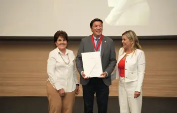 El registrador Hernán Penagos fue homenajeado en el auditorio de la Cámara de Comercio Medellín para Antioquia. Foto: Cortesía Registraduría