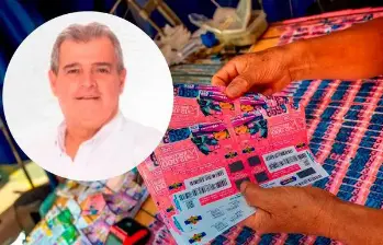 Adelante, el ex directivo y político Rubén Callejas, envuelto en la polémica. Atrás, una venta de lotería. FOTO: Camilo Suárez