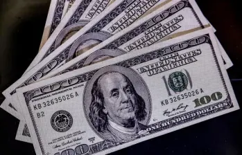 El dólar se cotiza en $3.112,46 y mantiene una tendencia bajista pese a la volatilidad registrada esta semana. FOTO COLPRENSA