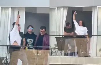 La mujer generó revuelo al disparar al menos cinco veces al aire desde el piso 12 de un conjunto residencial en Bogotá. FOTO: Captura de video