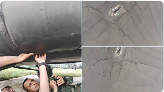 Soldados revisan la aeronave impactada desde tierra con fusil por el Clan del Golfo. FOTO: Cortesía Ejército Nacional. 