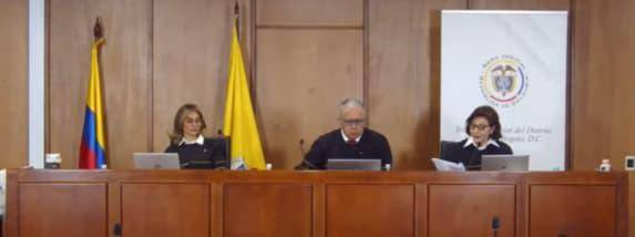 De izquierda a derecha; magistrados, Alexandra Ossa , Manuel Antonio Merchán y María Leonor Oviedo. esta última fue quien manifestó estar en desacuerdo con sus compañeros con respecto a la decisión tomada sobre el Caso Uribe. FOTO: captura de video.