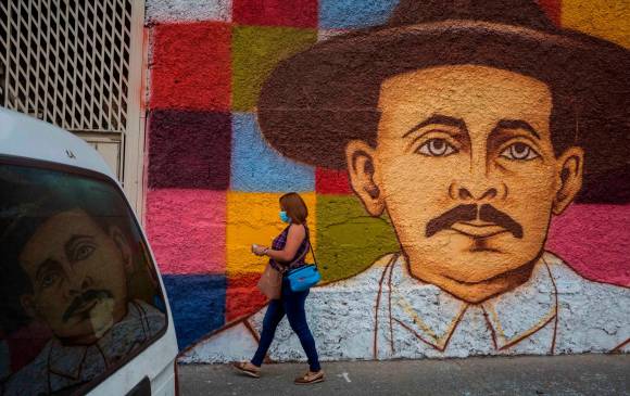 La devoción por el beato José Gregorio Hernández Cisneros hace parte del arte urbano en las calles de Caracas. FOTO efe
