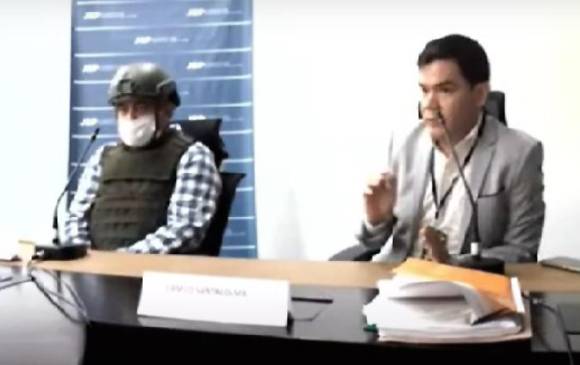En la audiencia de alias Otoniel dijo el pasado miércoles que ingresó a las Farc cuando tenía 16 años de edad, en el corregimiento de Nueva Colonia, Turbo. FOTO tomada del video de la audiencia 