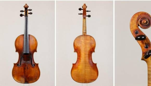 Fotografía cedida a Efe por el Consejo Nacional de Investigación de Italia (CNR) del viejo violín encontrado en un desván. FOTO EFE