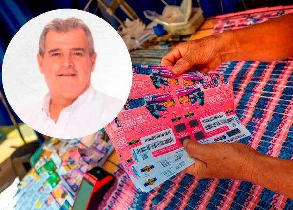 Adelante, el ex directivo y político Rubén Callejas, envuelto en la polémica. Atrás, una venta de lotería. FOTO: Camilo Suárez