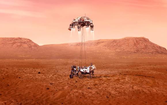 Fotografía cedida este miércoles por la Administración Nacional de Aeronáutica y el Espacio (NASA) que muestra una ilustración del rover Perseverance, mientras amartiza de forma segura sobre la superficie de Marte. Foto. EFE/ Emma Howells/ NASA/ 