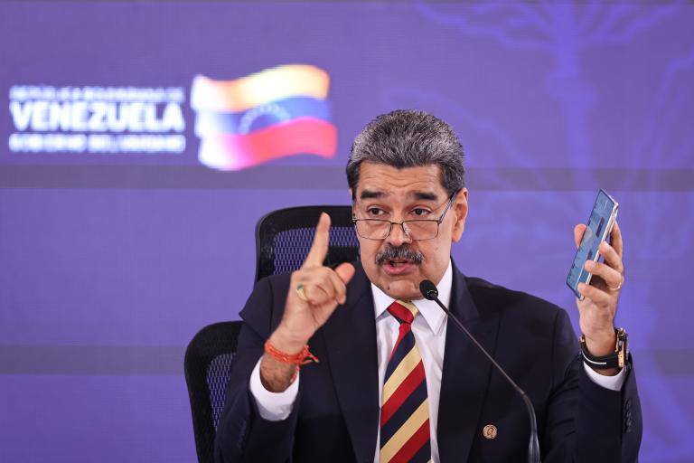 <span class="mln_uppercase_mln"> Nicolás</span><b><span class="mln_uppercase_mln"> Maduro dijo que la aplicación estará integrada con la Fuerza Armada Nacional Bolivariana (FANB) de Venezuela. FOTO: Getty</span></b>