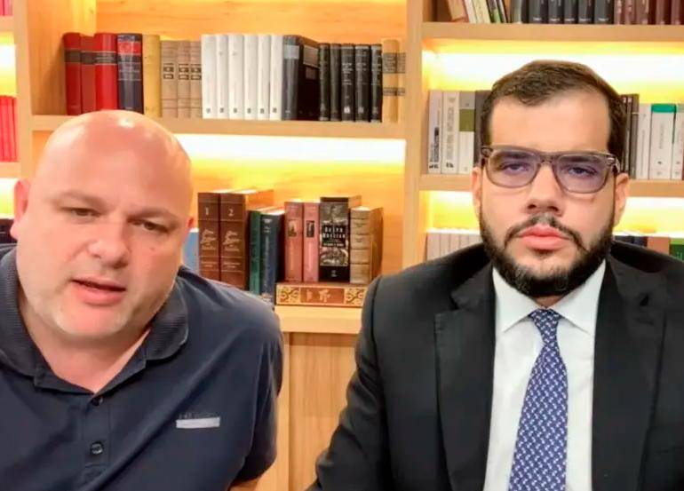 Miguel Quintero y Santiago Trespalacios, durante una audiencia celebrada de forma virtual por el caso AMVA-bomberos de Itagüí. FOTO: IMAGEN TOMADA DE AUDIENCIA