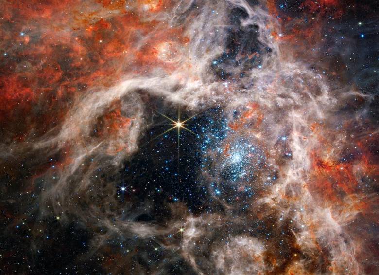 La Nebulosa de la Tarántula se encuentra a 161.000 años luz de la Tierra, en la galaxia de la Gran Nube de Magallanes, un lugar importante para la formación de estrellas. FOTO: NASA