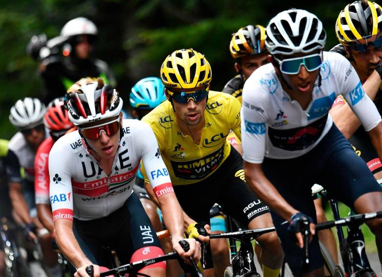 El colombiano Egan Bernal (derecha) y el esloveno Tadej Pogacar (izquierda), dos de los corredores jóvenes más exitosos en los últimos cinco años con títulos en grandes vueltas. FOTO AFP